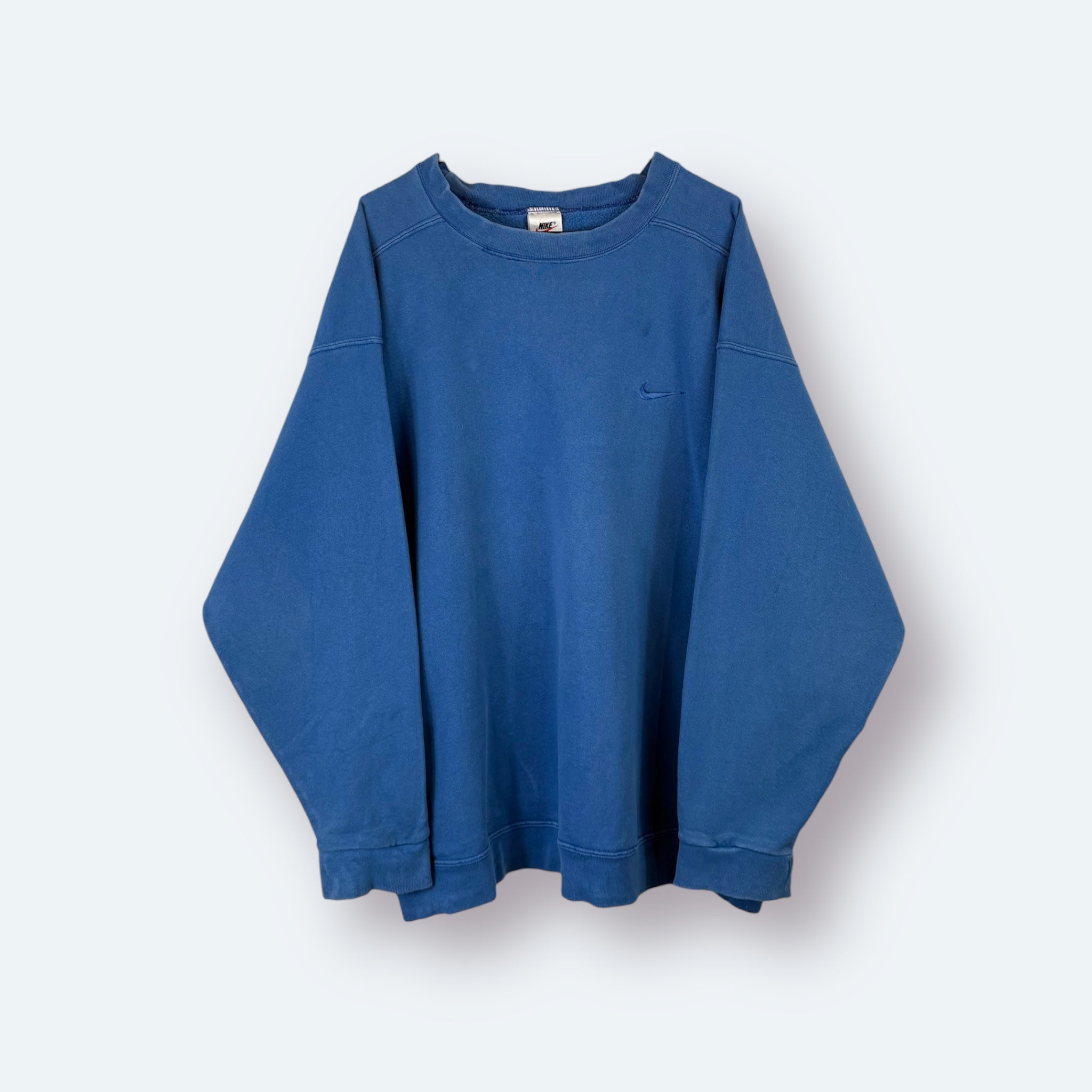 Nike - ausgeleiert, mehrere kleine Macken am Rücken - Vinverse