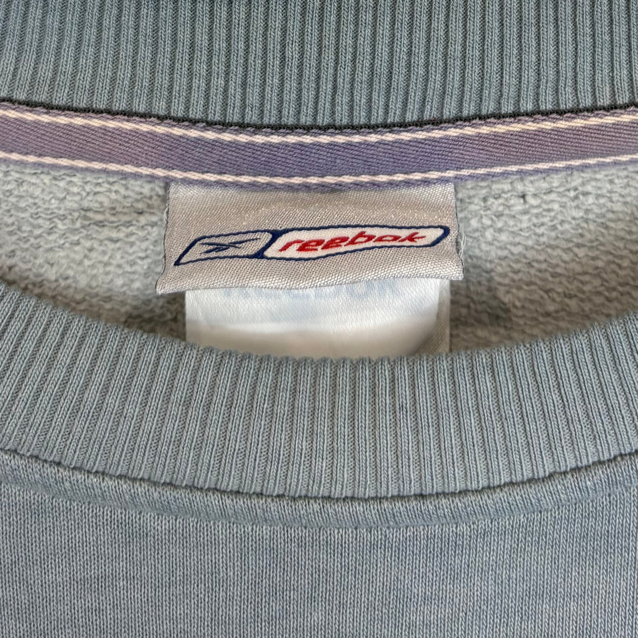 Reebok - Mini Fleck am Bauch - Vinverse